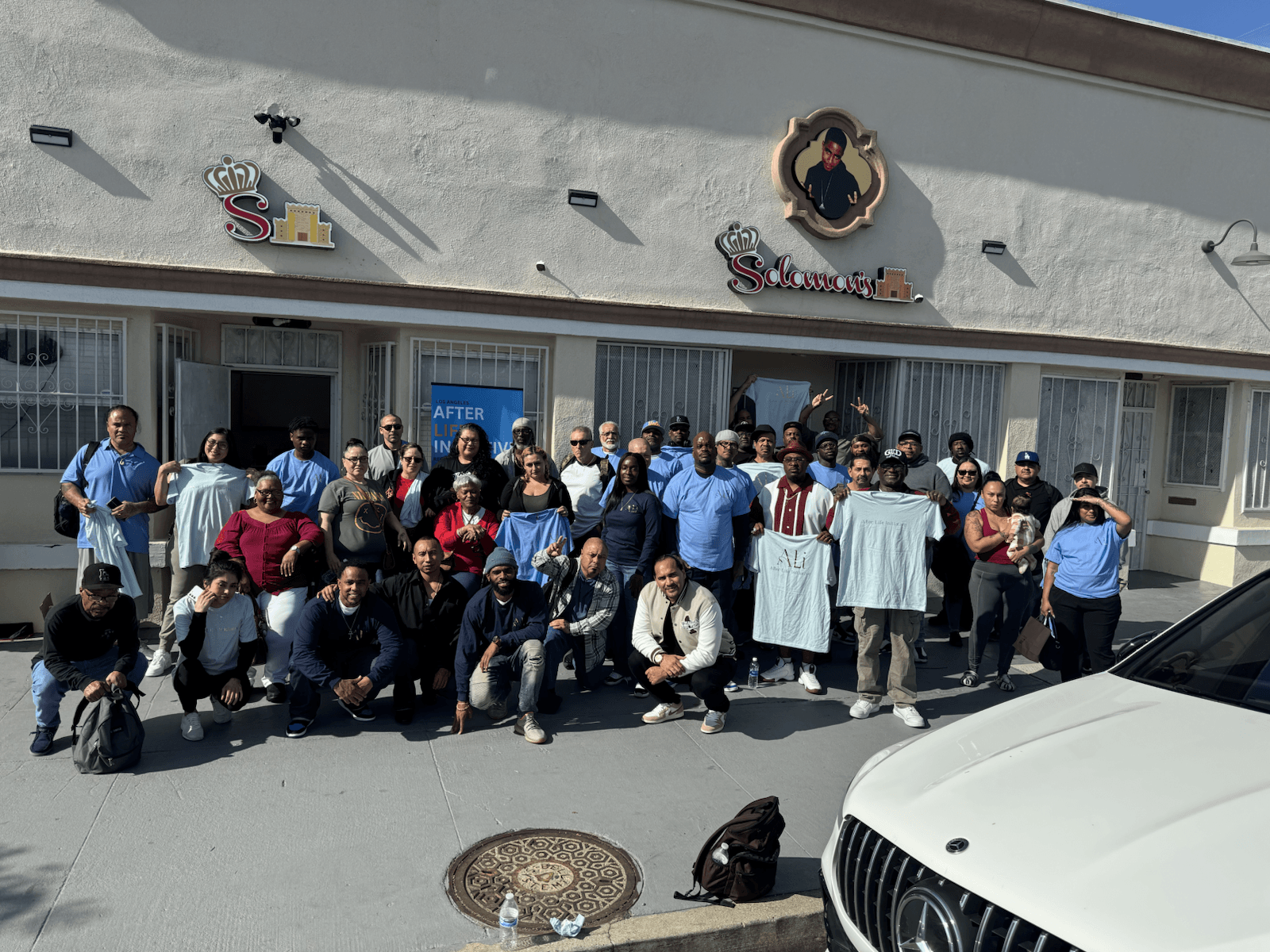 The team outside ALi’s first office